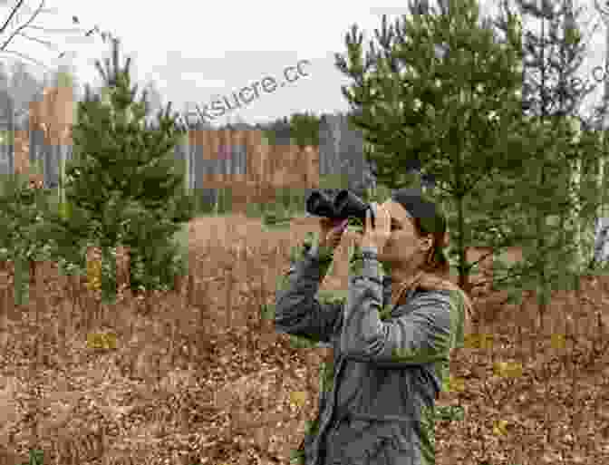 A Birdwatcher Observing Birds In A Forest, Holding A Pair Of Binoculars My Outdoor Life: The Sunday Times
