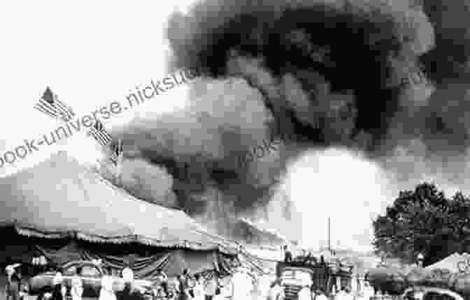 A Black And White Photograph Of The Hartford Circus Fire. The Big Top Tent Is Engulfed In Flames, And People Are Running For Their Lives. The Hartford Circus Fire: Tragedy Under The Big Top (Disaster)