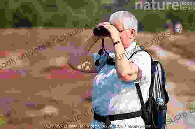 A Photo Of A Birdwatcher Looking Through Binoculars DRIFTWOOD MINE RANCH: Twelve Years In The Sonoran Desert At The Edge Of The Superstition Wilderness