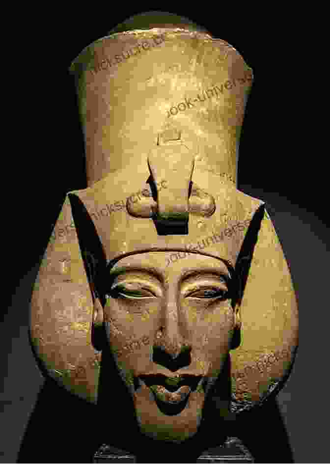 A Statue Of Akhenaten, The Pharaoh Of Egypt, Depicted With His Characteristic Elongated Face And Headdress. The Life And Times Of Akhenaton Pharaoh Of Egypt: Illustrated Edition