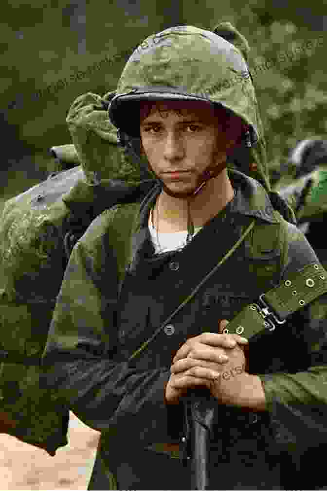 A Young Marine In Combat Gear During The Vietnam War, With A Determined Look On His Face And Holding A Rifle Vietnam Perkasie: A Combat Marine Memoir