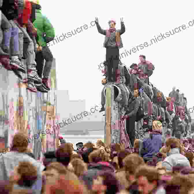 People Celebrating On Top Of The Berlin Wall After It Fell. 10 Major Events No One Saw Coming