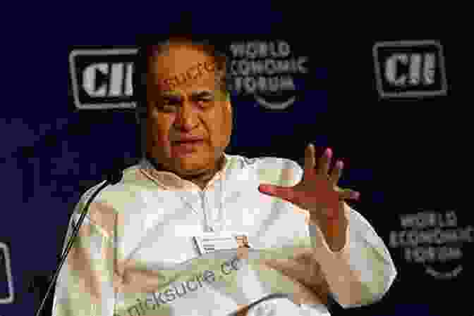 Rahul Bajaj Seated In A Meeting Room, Surrounded By Other People Rahul Bajaj: An Extraordinary Life