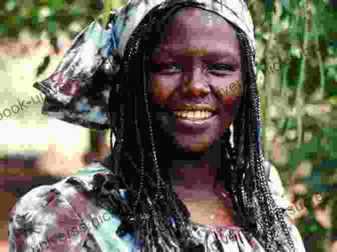 Wangari Maathai, A Smiling Woman With A Green Scarf Draped Around Her Shoulders, Stands In A Field Of Trees. Unbowed: A Memoir Wangari Maathai